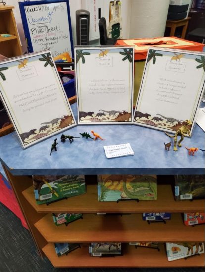 Library Display of dinosaur books and figurines